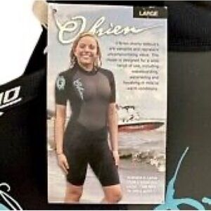 New NWT O’Brien Shorty black purple wetsuit short sleeve Med neoprene